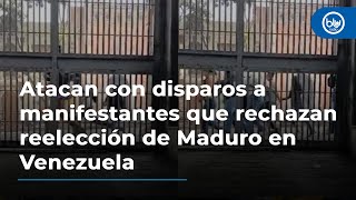 Atacan con disparos a manifestantes que rechazan reelección de Maduro en Venezuela [upl. by Oiretule500]