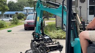 Chinese mini excavator loading suv on trailer [upl. by Leamse]