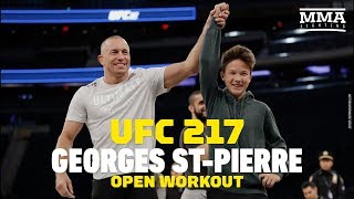 Georges StPierre Teaches Moves to Lucky Fan at UFC 217 Open Workouts  MMA Fighting [upl. by Suirred386]