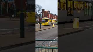 Beautiful yellow tram passing through Oldham town centre and going to Victoria station Manchester [upl. by Trautman309]