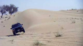 Huge Desert Dune Jump with Jeep Cherokee Empty quarter Abu Dhabi [upl. by Acissej]