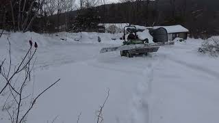 John Deere 3038E pushing 20 Inches of Snow old [upl. by Tarsus]