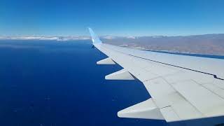 TUI Boeing 737Max8 wingview landing at Aeropuerto de Gran Canaria GCLPLPA runway 03L [upl. by Jeffy479]