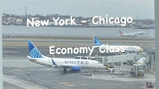 TRIP REPORT UNITED AIRLINES  New York to Chicago Boeing 737700  Economy Class [upl. by Linkoski]