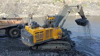 BEML 1000 excavator loading Caterpillar Dumper [upl. by Busch]