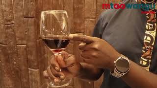 Sommelier Ogada George explains the etiquette when taking wine [upl. by Thayer443]