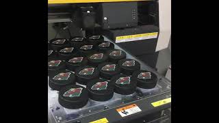 Mimaki UJF3042FX Hockey Puck Printing Video [upl. by Komarek]