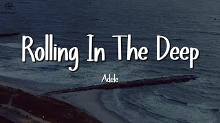 Adele  Rolling In The Deep Lyrics [upl. by Surtimed]