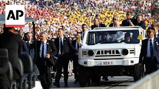 Pope Francis celebrates Mass before an estimated 100000 people in Indonesia [upl. by Malilliw191]