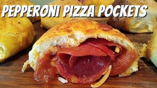 Making Pizza Pockets with Canned Biscuits [upl. by Oicor]