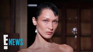 Bella Hadid Has Dress SPRAYPAINTED ON During Runway Show  E News [upl. by Annahsad]