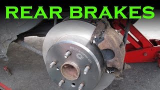 How to Replace Rear Brake Pads and Rotors [upl. by Bahr671]