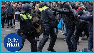 Protests in Europe Police in Amsterdam clash with antilockdown protesters [upl. by Riti183]