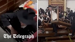 Riot breaks out in New York City synagogue over secret tunnel [upl. by Durst]