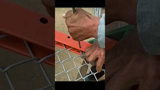 The process of fixing the metal mesh in the frame of the outboard fence [upl. by Dareg742]