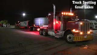 Red Peterbilt Hauling Tires Bigger Than The Truck [upl. by Griffis371]