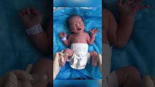 The nurse helped the newborn check his body The newborns small body is very cute [upl. by Merill]