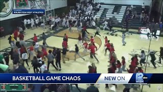 Police cite 4 students following fight at rivalry basketball game [upl. by Laehcimaj]