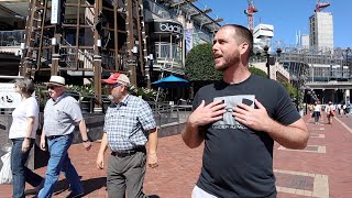 Preaching against evolution at Sydneys Darling Harbour in Australia [upl. by Jarlath]