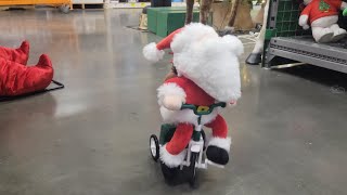 Singing Santa on a tricycle and rollerblades animatronics christmas [upl. by Nylsirhc]