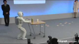 Hondas Asimo robot gets faster and smarter in human makeover [upl. by Yarak]