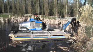 Bulrush control with Truxor and clamshell attachment [upl. by Grunenwald]