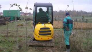 Excavator and the spade for the plants of trees [upl. by Galitea666]