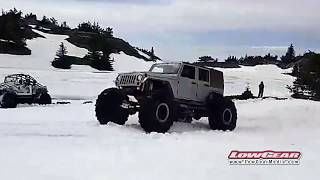 Jeep​ JK on 54quot Tires with 900HP Attacks Snow Hill [upl. by Anaes]