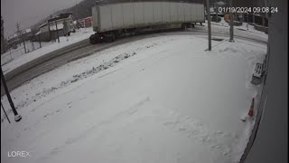 Security video captures semitruck jackknifing during winter weather [upl. by Aisatna]