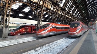 Circolazione dei treni sui binari della stazione di Milano Centrale con il sole [upl. by Epuladaug]