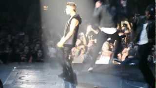 Justin Bieber breaking a camera on stage while showing off his abs Believe Tour Hamburg HQ [upl. by Kerri498]