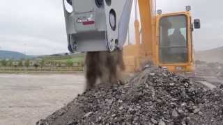 Xcentric Crusher bucket XC20 crushing Asphalt [upl. by Ahtrim]