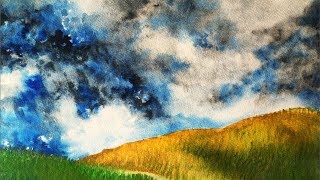 Turbulent Sky over rolling hills a step by step Watercolor Tutorial [upl. by Leandro810]