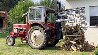 Brennnholz Gitterboxen mit Kistendrehgerät Hubmast und IHC 433 ausfahren und auskippen [upl. by Nnomae]