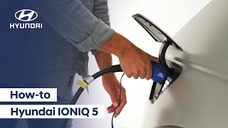 Hyundai IONIQ 5 opladen laadkabel aansluiten en laadsnelheid [upl. by Koah]