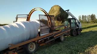 Brabant Horses round baling hay in early summer 2017 [upl. by Mellman379]