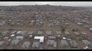 Drone shot of South African Township Ungraded Footage [upl. by Ayekel]