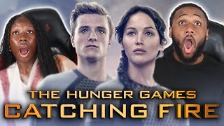 OUR FIRST TIME WATCHING THE HUNGER GAMES CATCHING FIRE  MOVIE REACTION [upl. by Silberman]