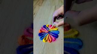 easy and colourful rangoli just in 2 minutes easyrangoliletscreateuniquebegginerrangolirangoli [upl. by Bivins]