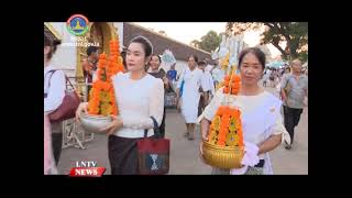 Hundreds joined the colorful wax castle procession on Thursday at the That Luang festival [upl. by Ellenad623]