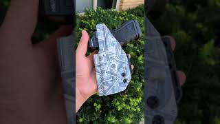 Our ulticlip no belt required holster in a custom 100 print shorts shortsvideo glock holster [upl. by Alemap]