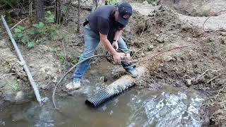 Cheap Easy Culvert fix to Unplug a Clogged Culvert Pipe [upl. by Eitisahc]