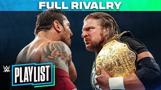 Batista vs Triple H – RIVALRY HISTORY WWE Playlist [upl. by Selmore]