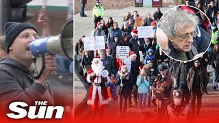 Antilockdown protesters shout at shoppers to remove their masks as demonstrations hit the UK [upl. by Abagail]