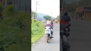 Driving with a rice cooker as a helmet funny funnyvideo [upl. by Arakat]