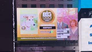 NYC Big Book Award showcasing awardwinning authors in NYC Times Square Billboard 3 [upl. by Fairleigh]