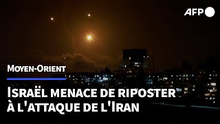 Israël tir de 200 missiles par lIran que Netanyahu menace de représailles  AFP [upl. by Deraj]