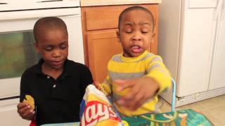 Zay Zay amp Jojo tasting Chicken and Waffles flavored chips [upl. by Ahsita942]