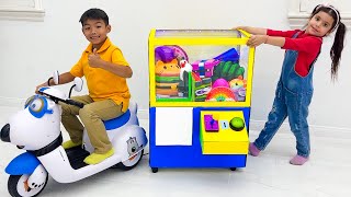 Eric and Ellie Claw Machine with Toys Kids Story  Kids Helping Children [upl. by Durstin]