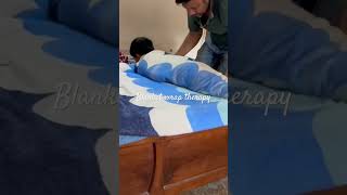 Blanket wrap session with Vihan shorts ytshorts therapy blanket autism training [upl. by Boccaj677]